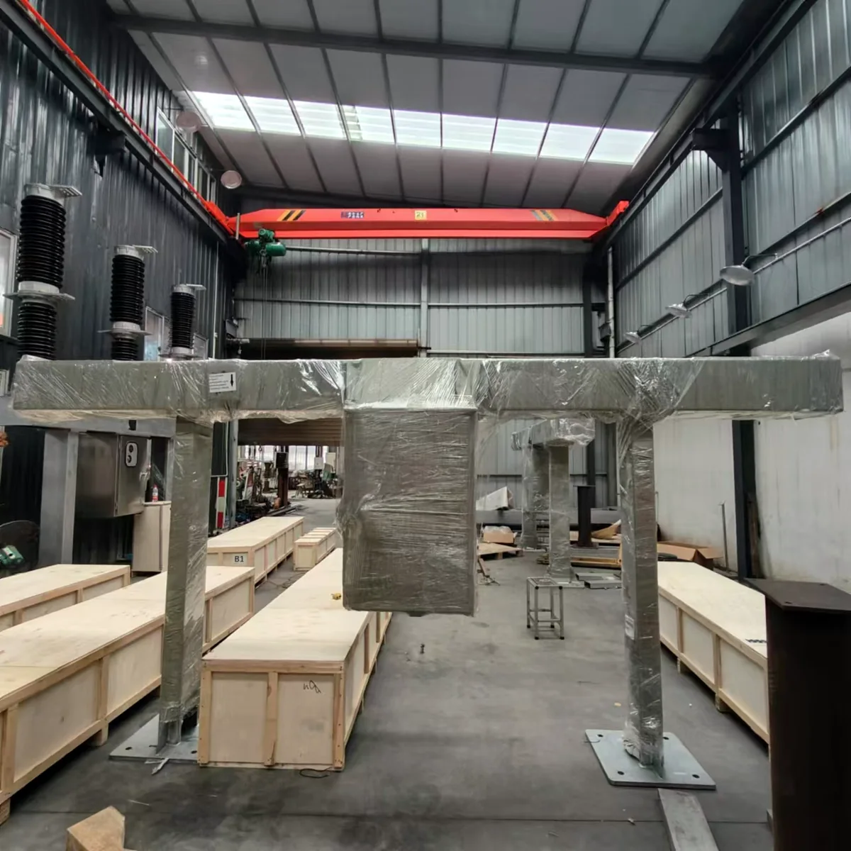 Wood crate packing area for heavy electrical equipment export shipments